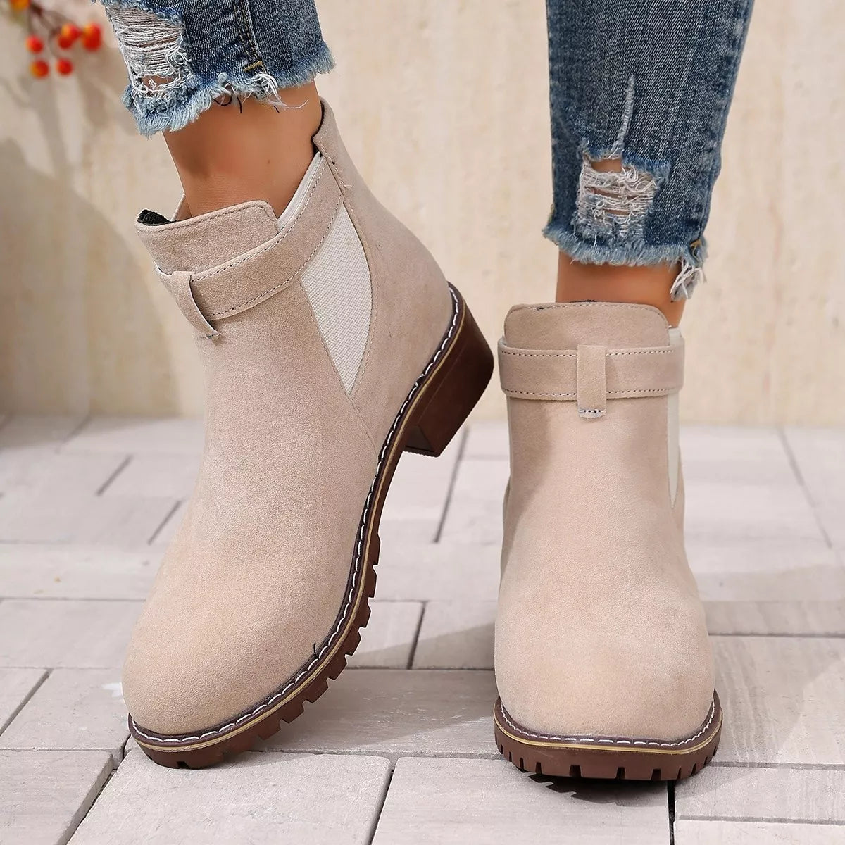 Round toe block heel boots standing pair