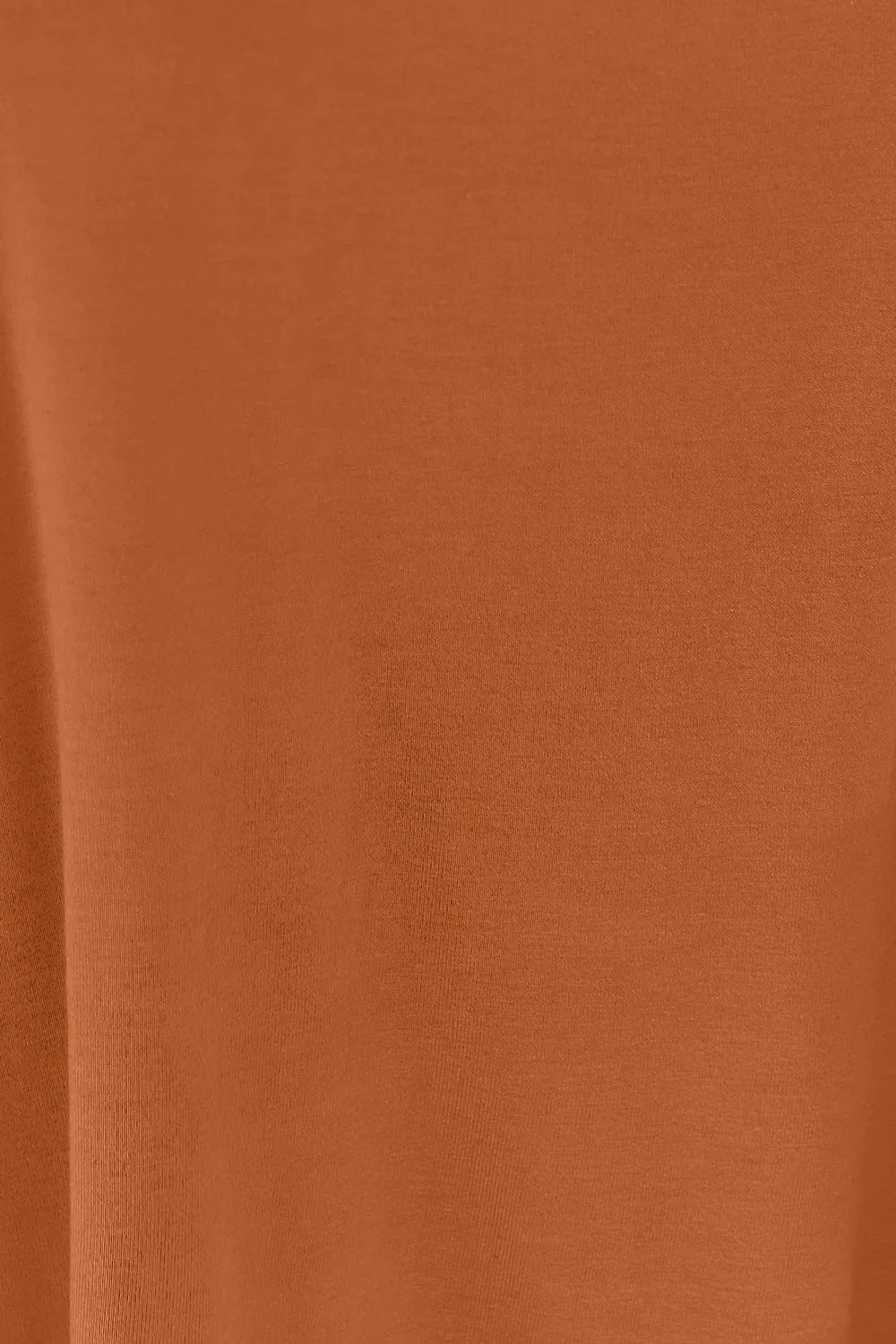Close up of lace trim at the V neckline