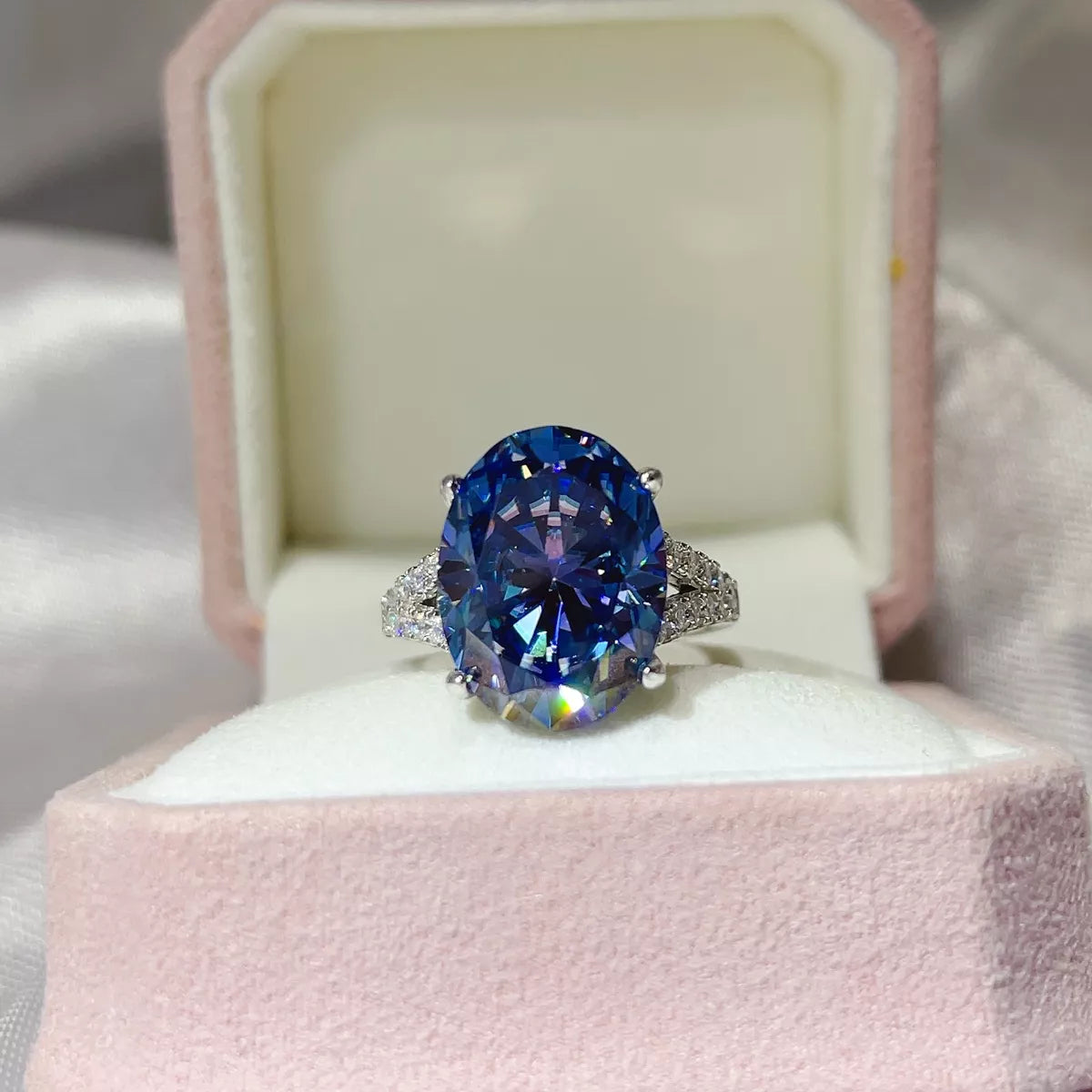Close up of blue moissanite stone catching light