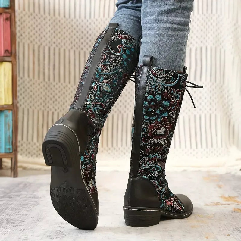 Embroidered knee high boots toe close up