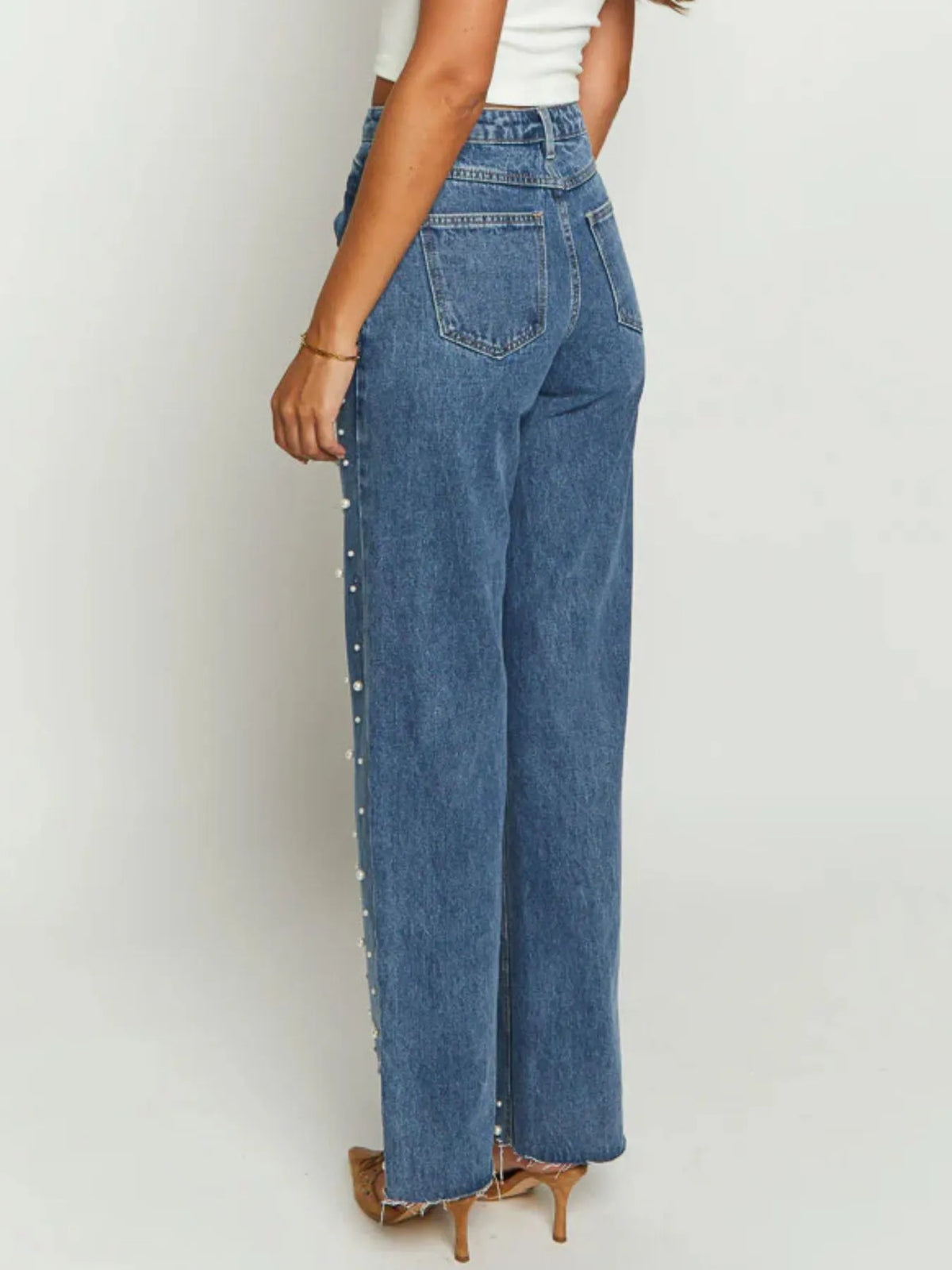 High waist embellished denim side profile