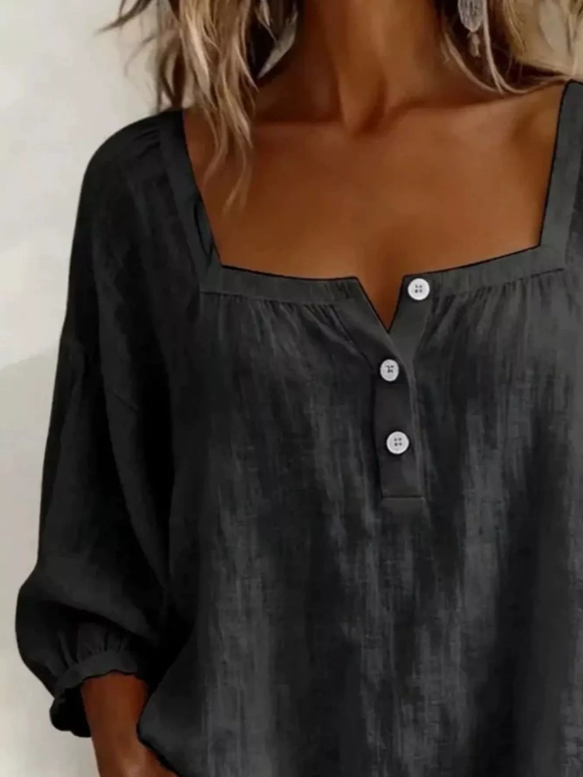 Square neck blouse showing button detail