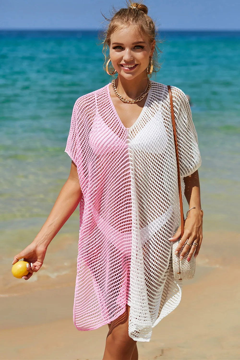 Openwork cover up styled over swimwear full length