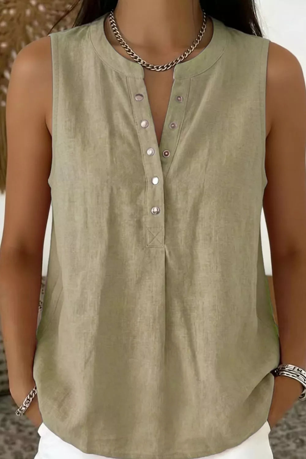 Snap down top in taupe styled with trousers