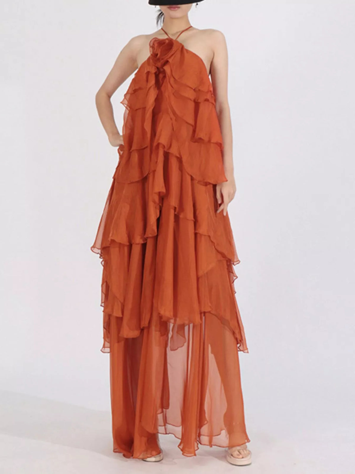 Ruffled chiffon halter neck maxi dress hem detail