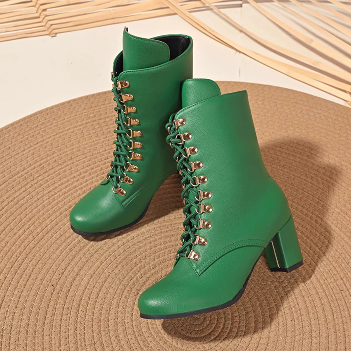Lace up block heel boots sole view