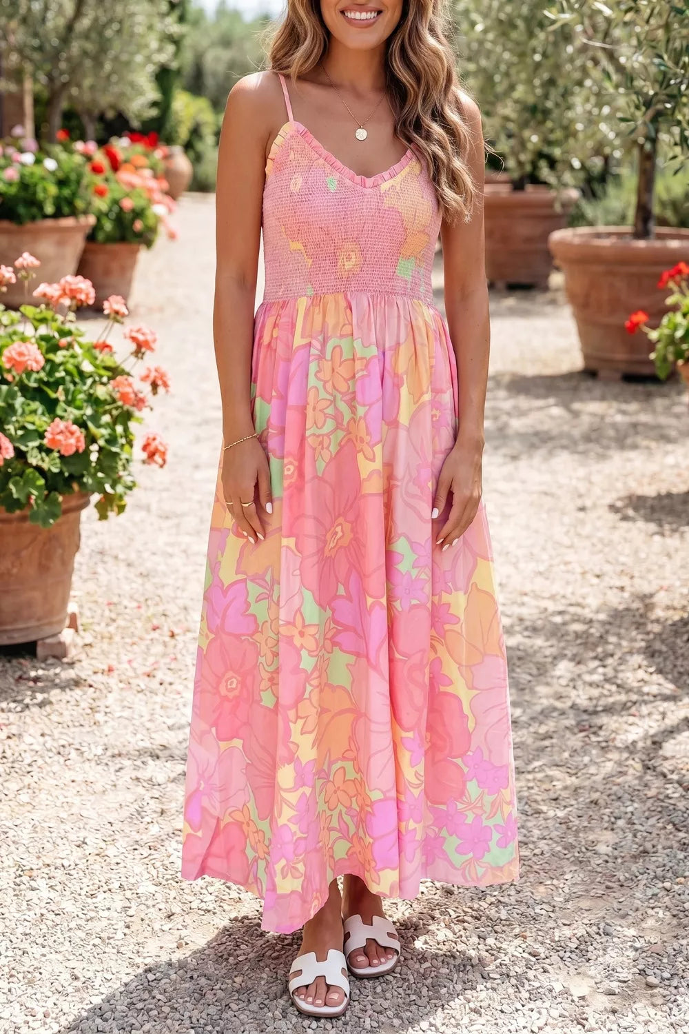 Dusty pink floral smocked maxi dress with spaghetti straps front view