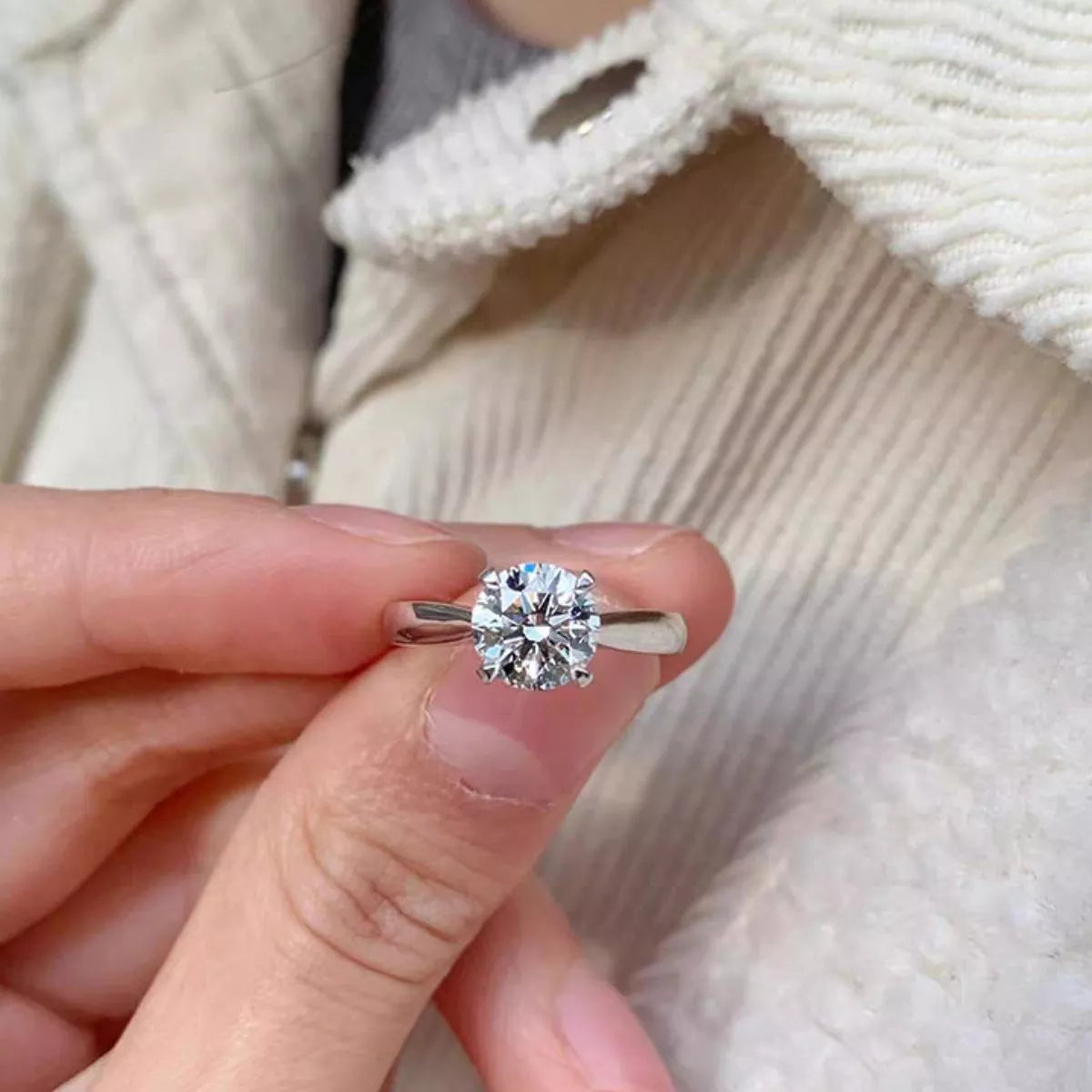 Angled view of the adjustable moissanite silver ring