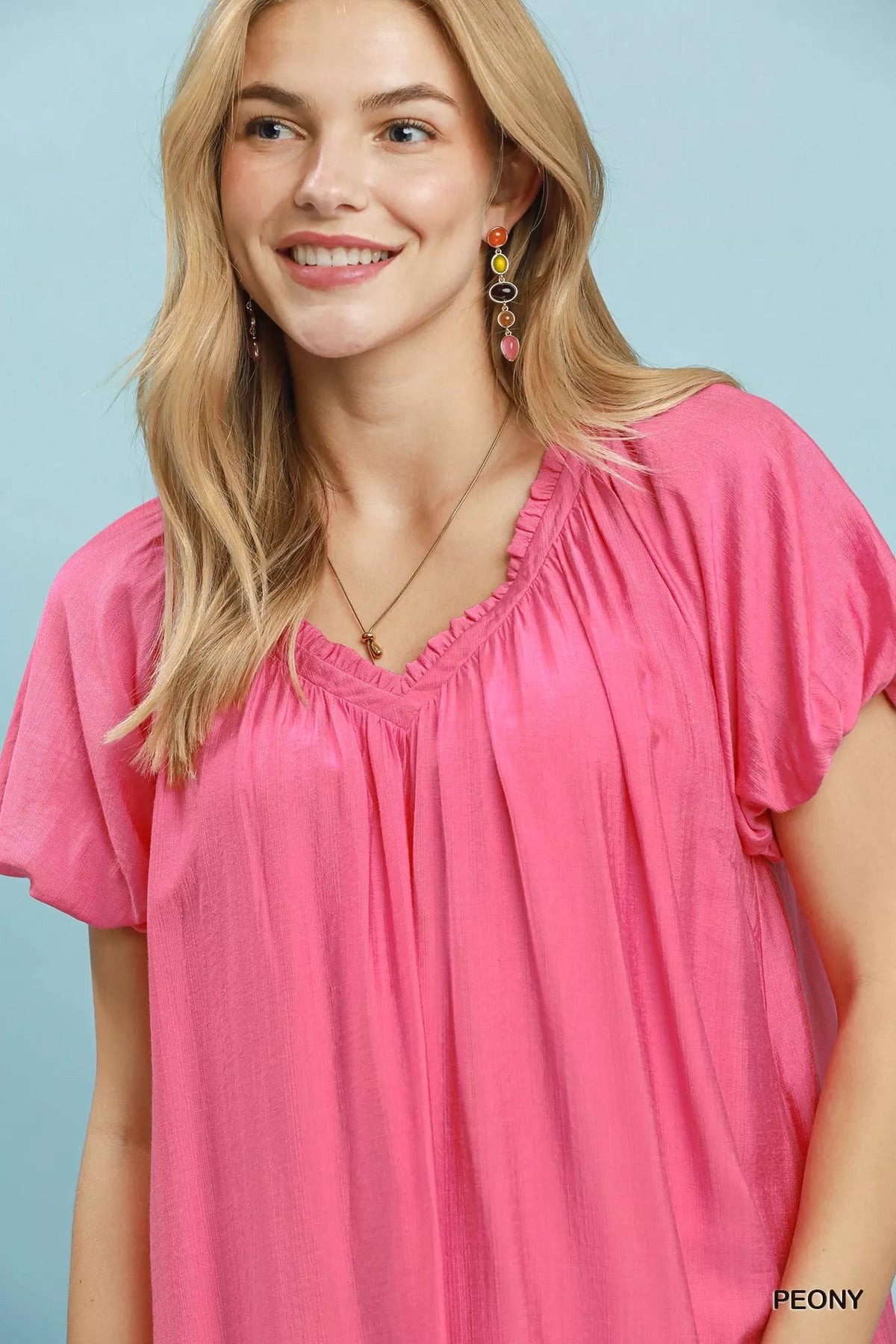 Pink V neck ruffle trim dress detail
