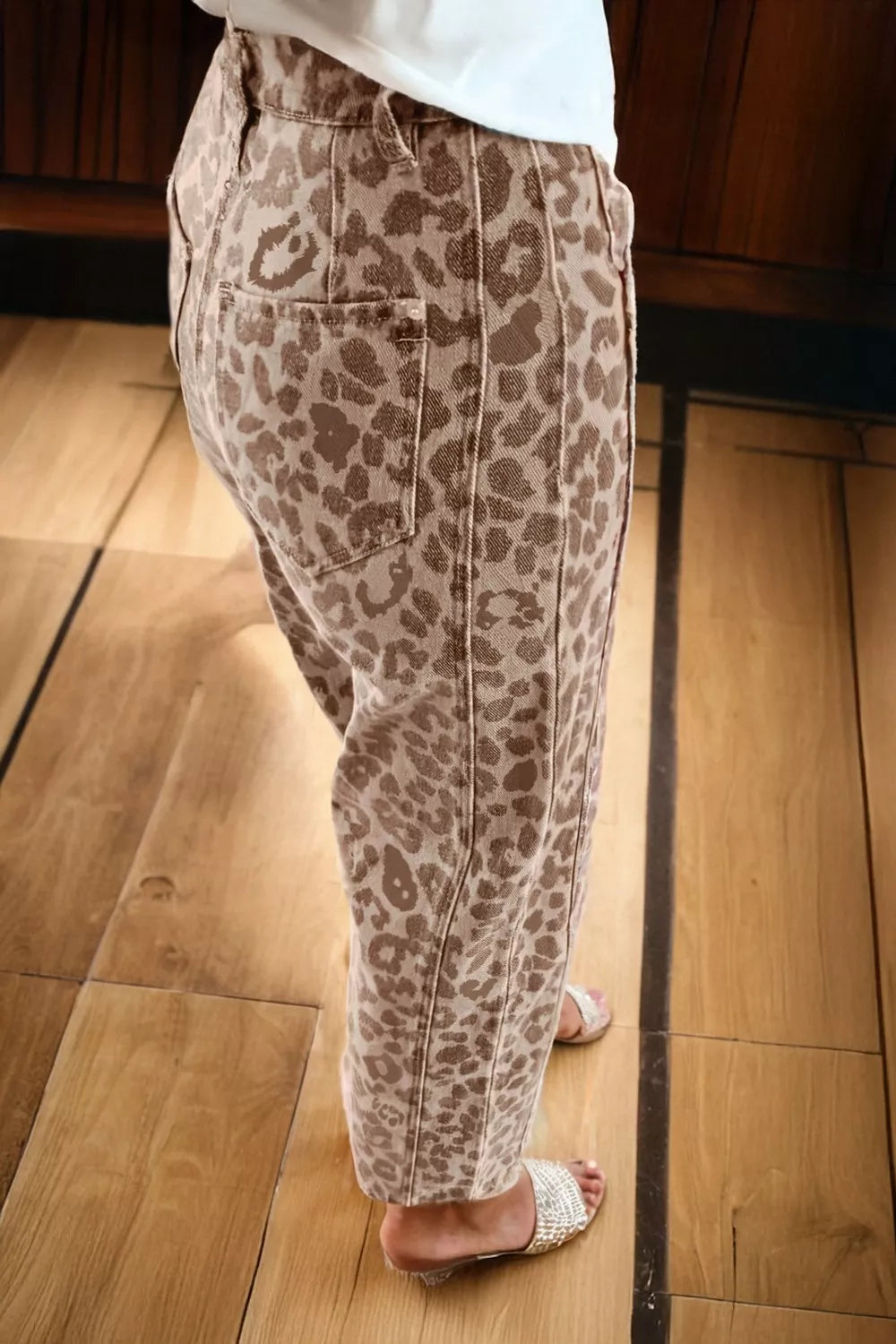 Cropped jeans showing bold leopard pattern