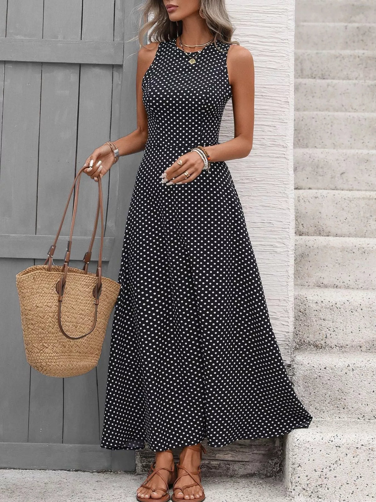 Sleeveless polka dot maxi dress side view