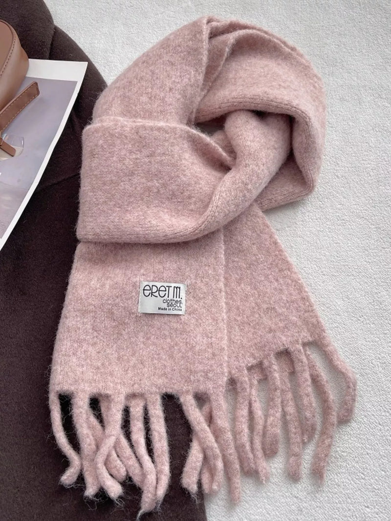 Solid color fringe scarf shown at full length