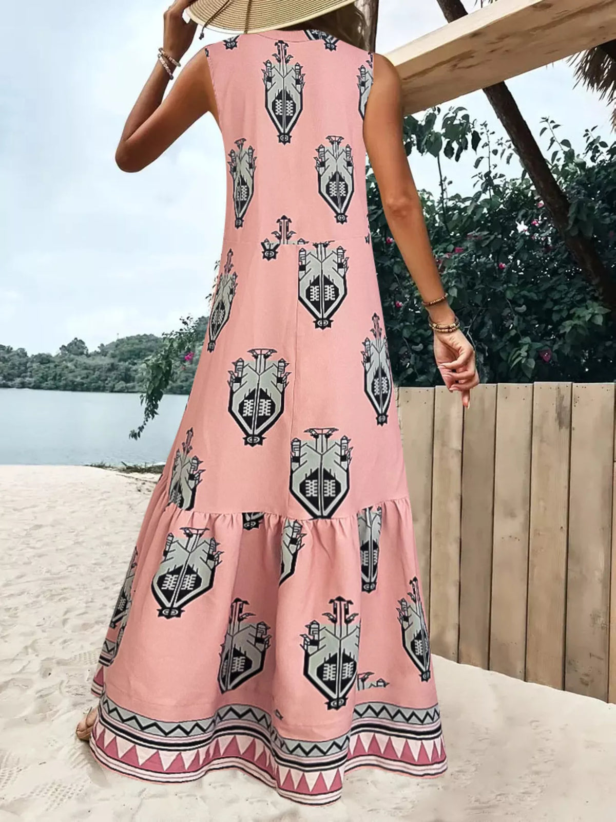 Printed sleeveless tiered maxi dress, three quarter view