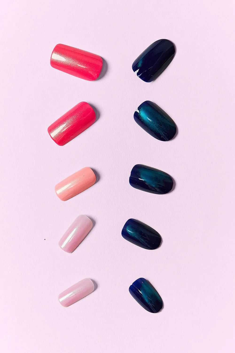 Press on nails shown on both hands