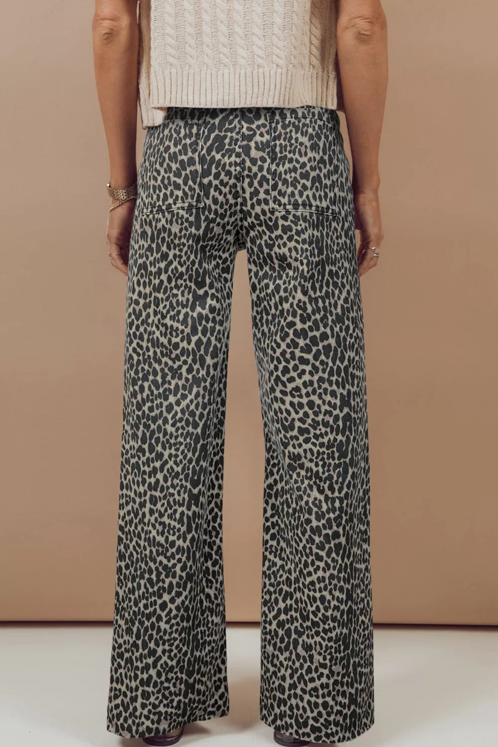Side view of leopard print wide leg jeans