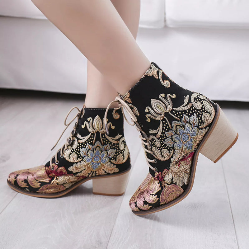 Gold embroidered floral lace up ankle boots side profile view