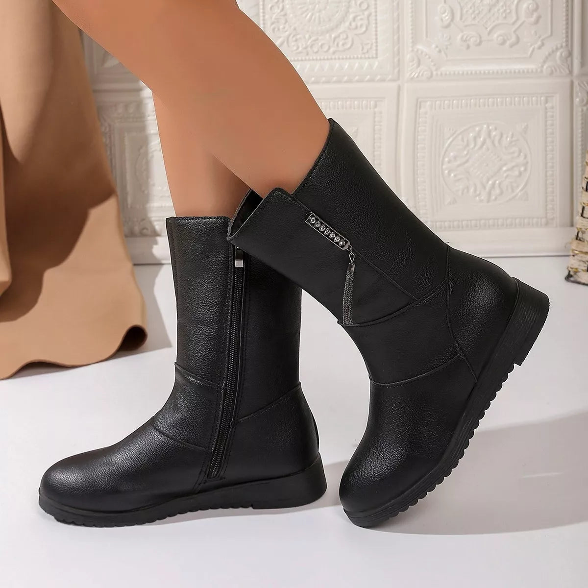 black round toe side zip boots front view