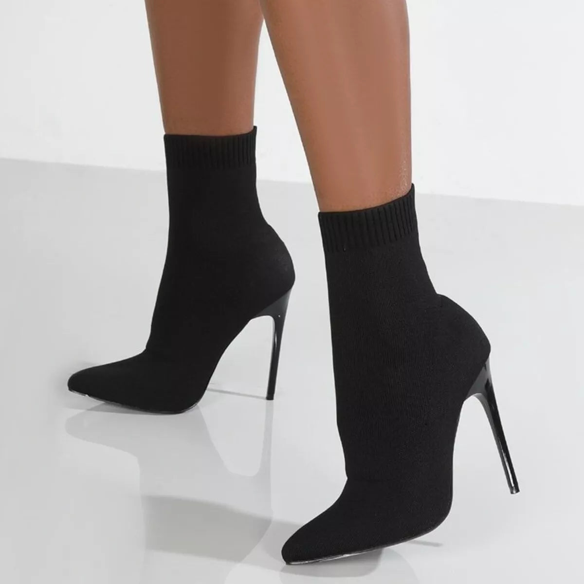 Point toe stiletto boots front view