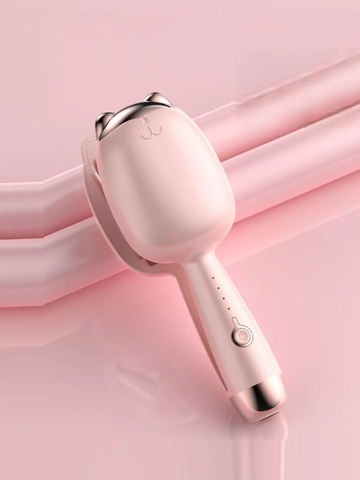 Cat shaped curler in use on hair