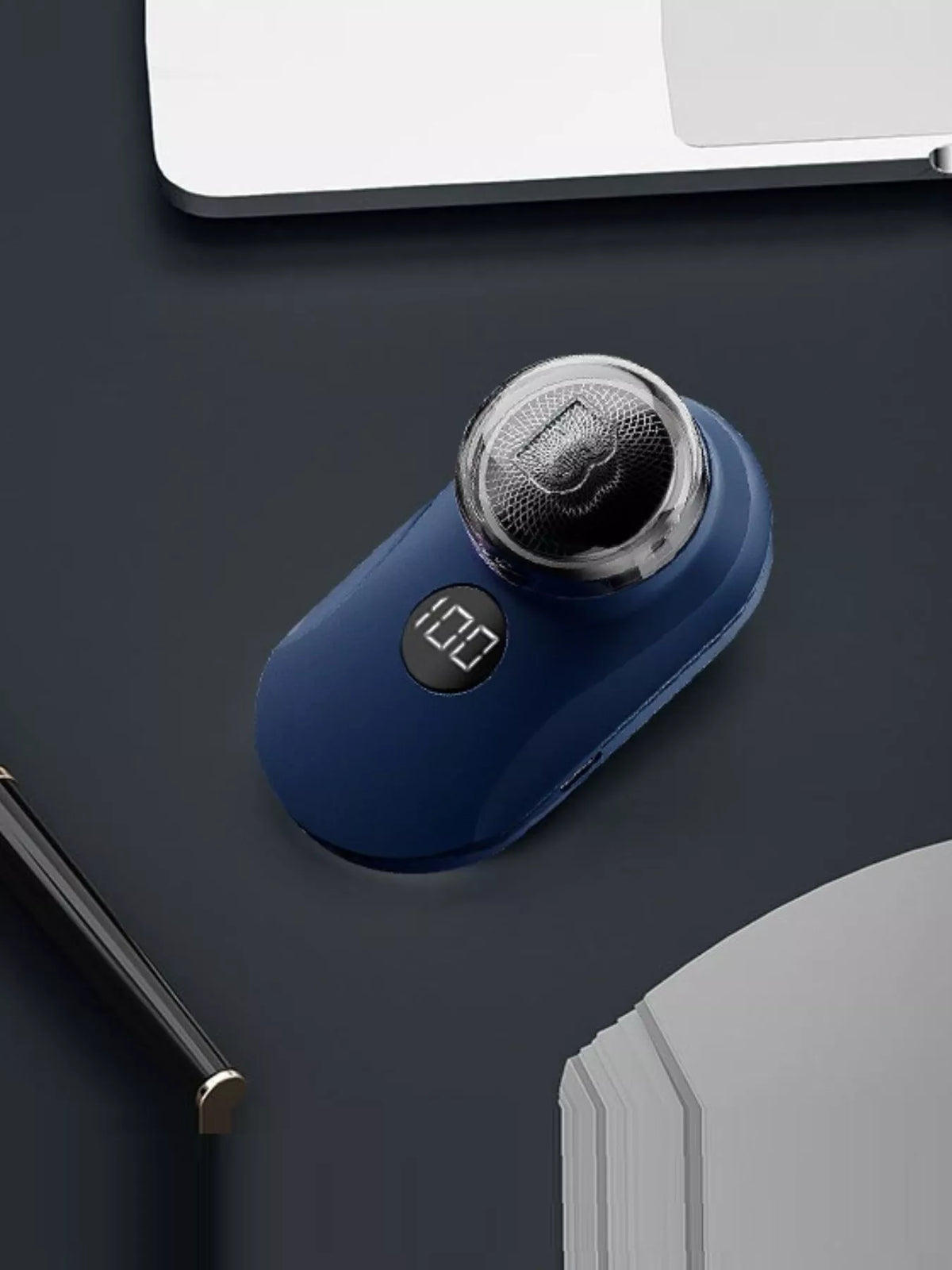 Orange mini electric shaver