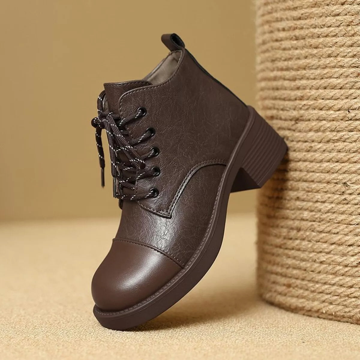 brown round toe block heel boots heel detail