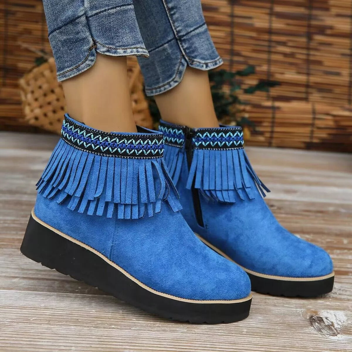 Fringe round toe ankle boots angled view