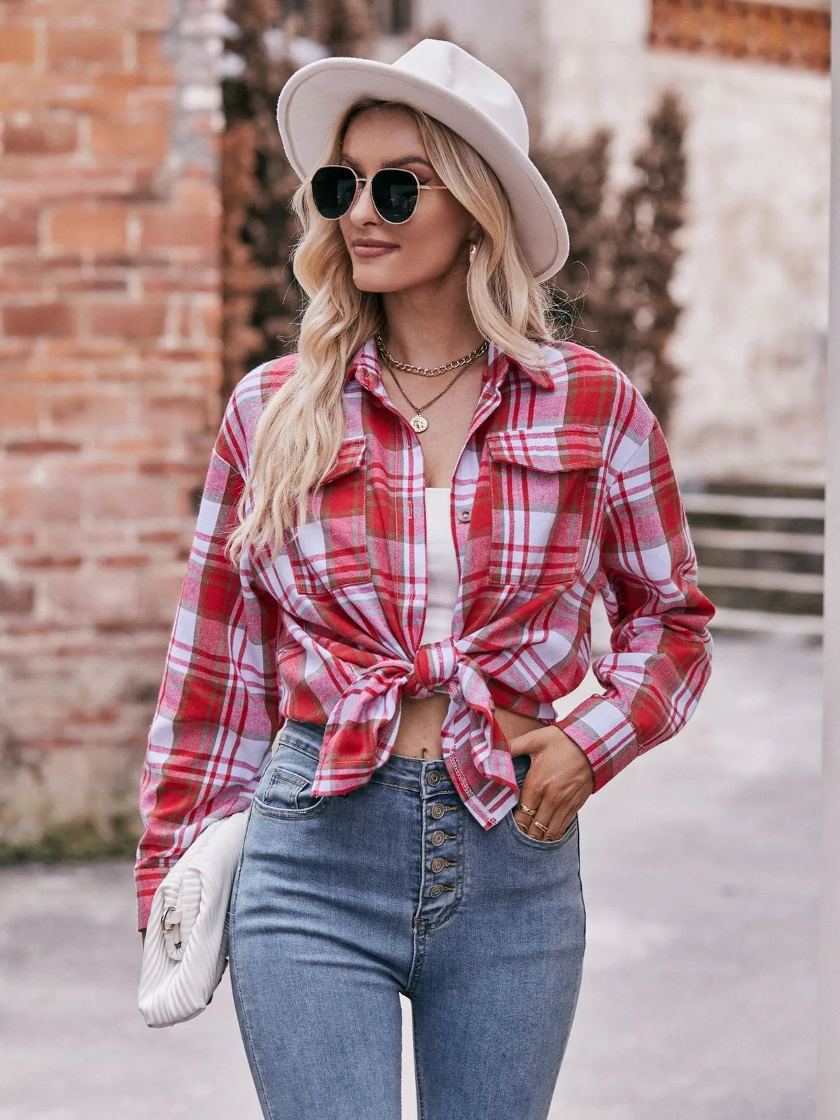 Front view of the plaid long sleeve button down shirt