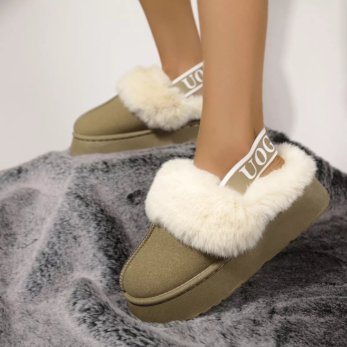 Round toe platform ankle boots in suede sole view