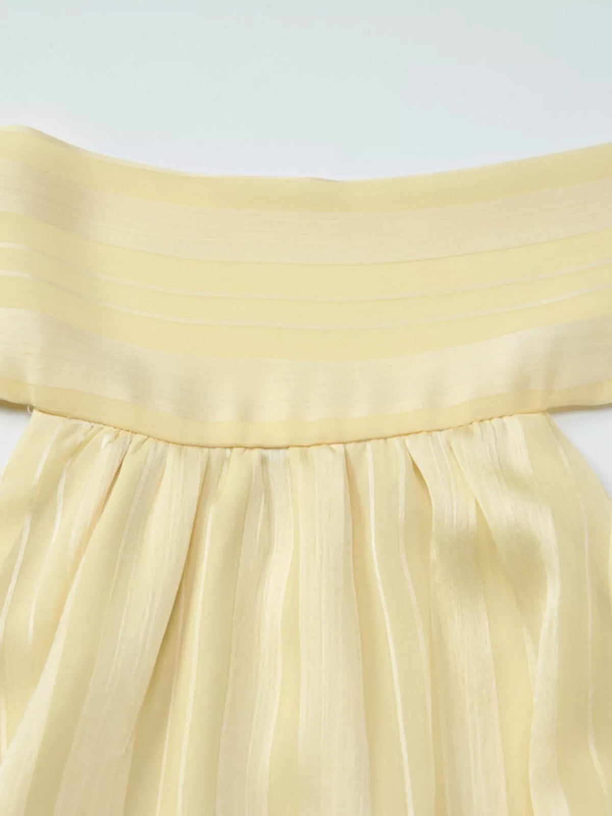 Shoulder and upper back on the halter neck cami