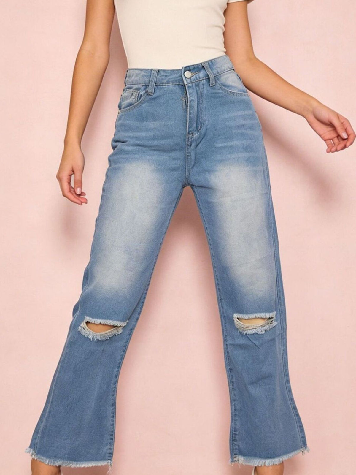 Distressed raw hem bootcut jeans front view