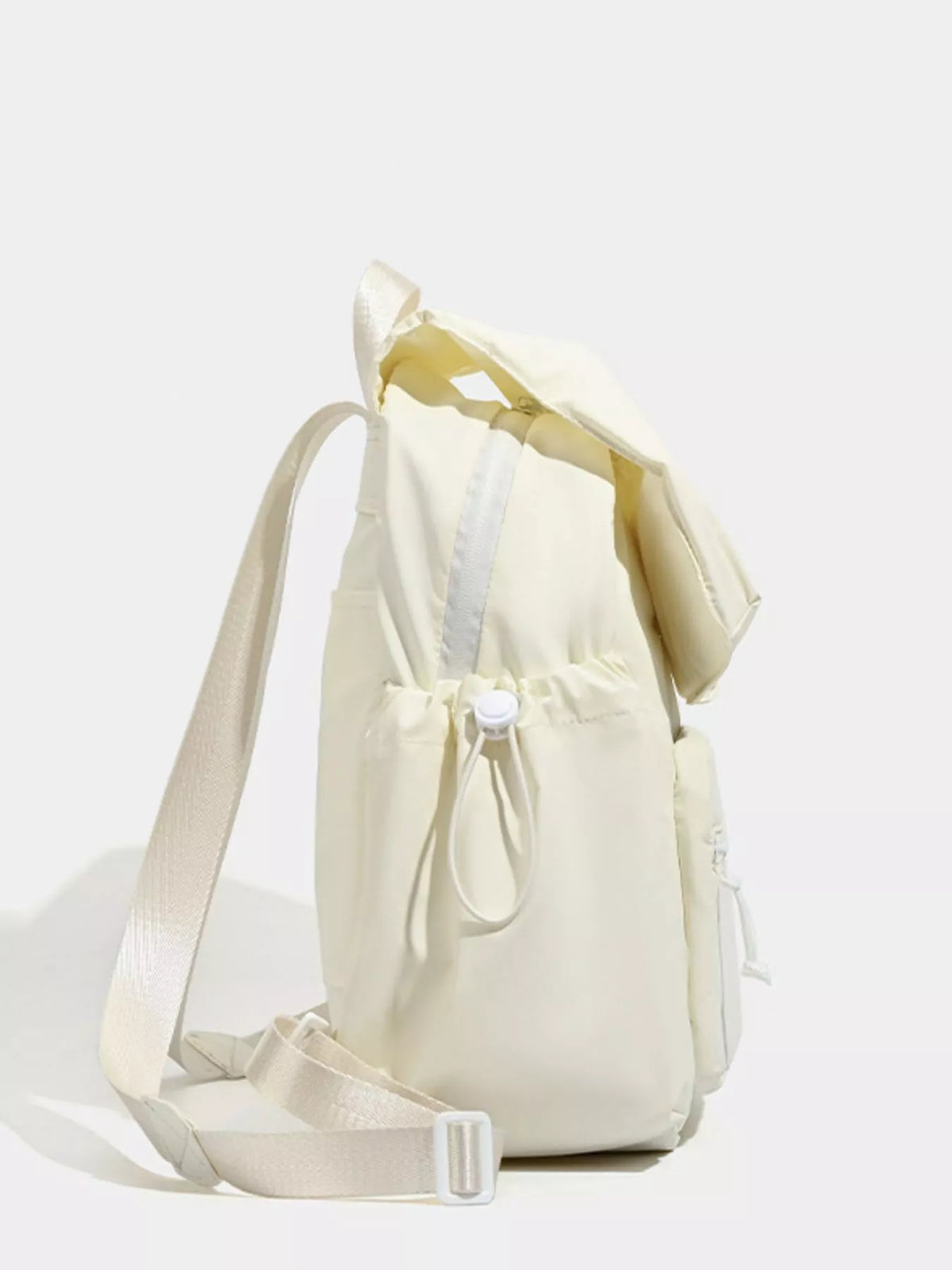 White canvas backpack back view