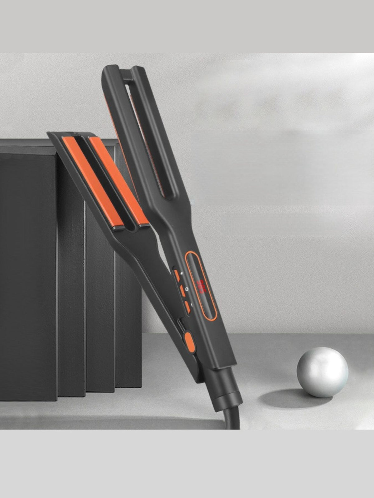 Dark gray fast heating hair straightener front view