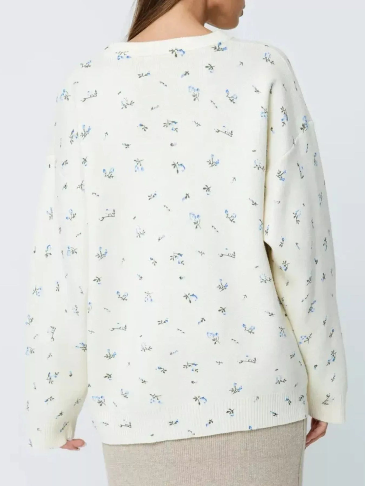 ribbed hem floral long sleeve sweater side profile view