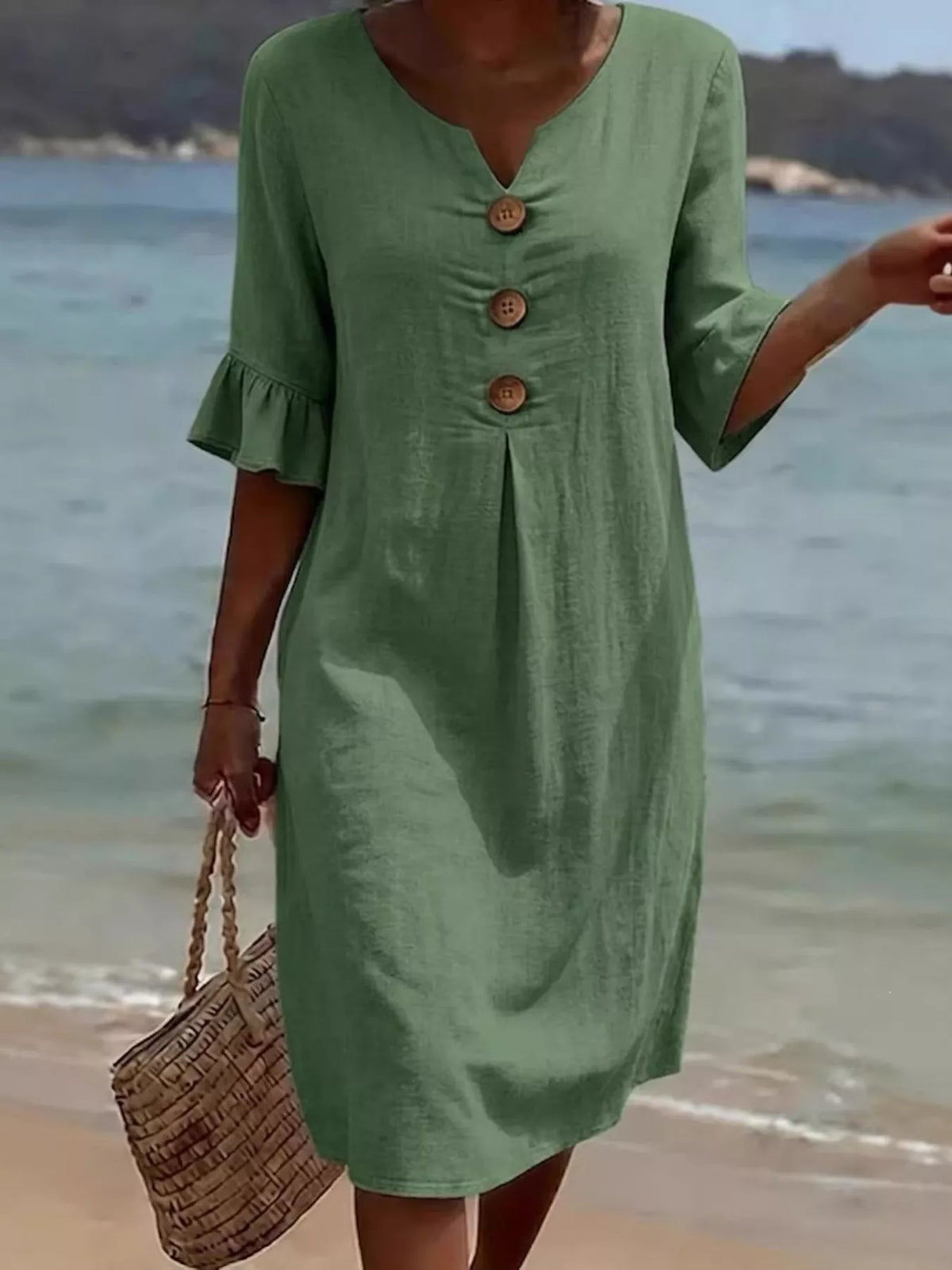 Button front dress shown in black
