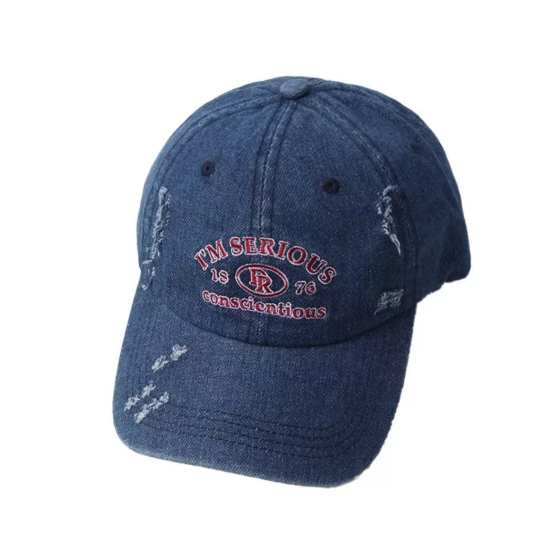 Cotton distressed cap back view with closure