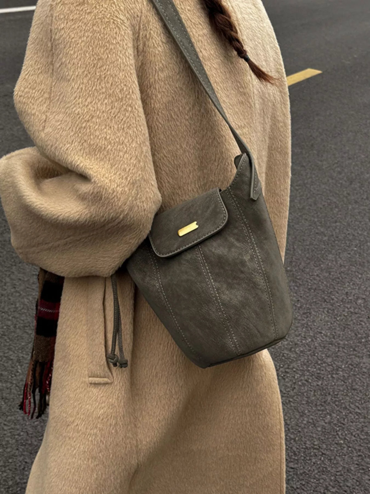 Vintage green suede bucket bag front view