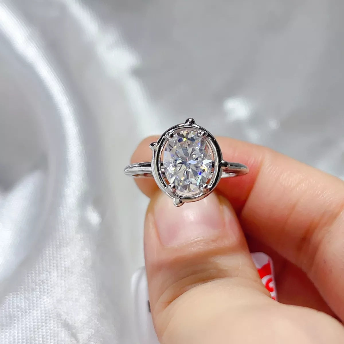 Starglow 2 carat oval cut moissanite ring in 925 sterling silver, front view