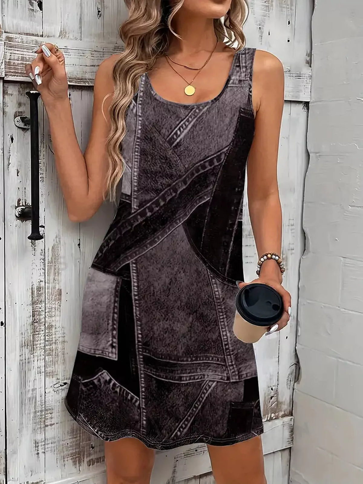 Patchwork print dress shown in a black colourway