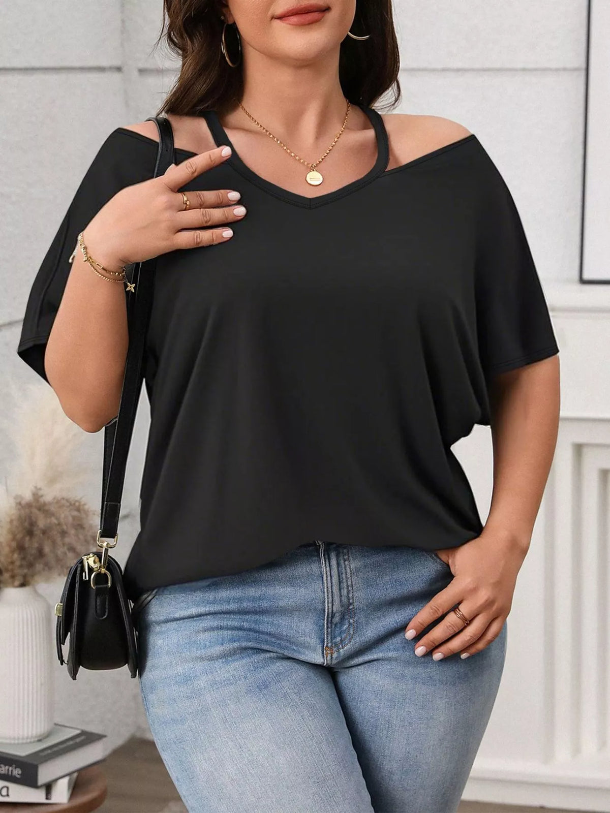 Black cold shoulder top side view