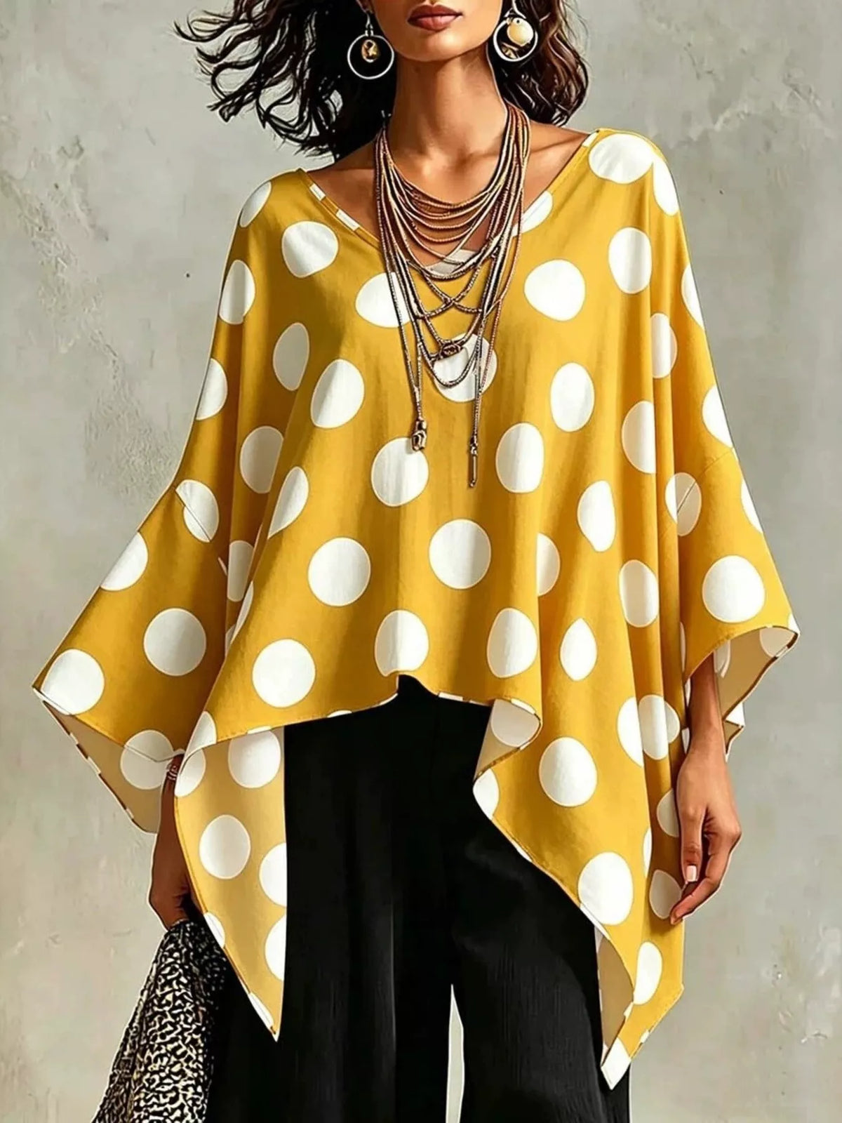 Polka dot blouse shown in a gold colourway