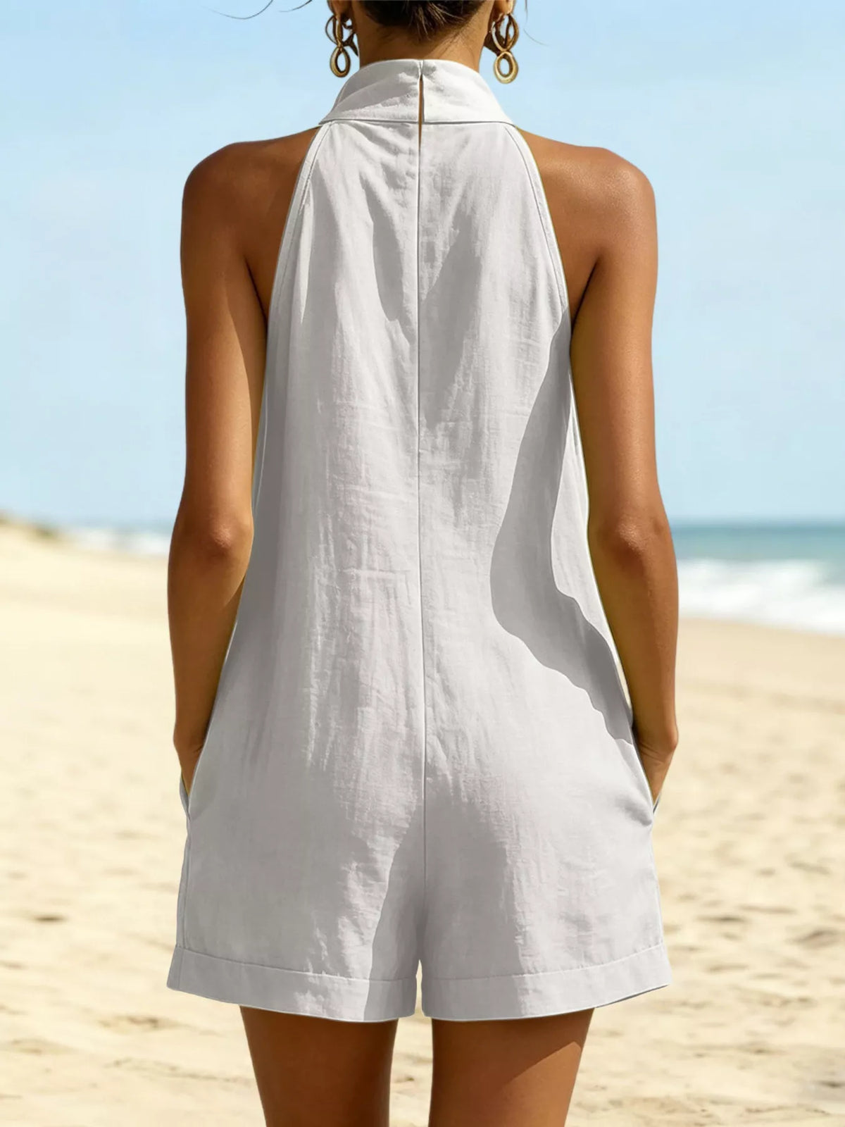 Halter neck romper with pockets side view