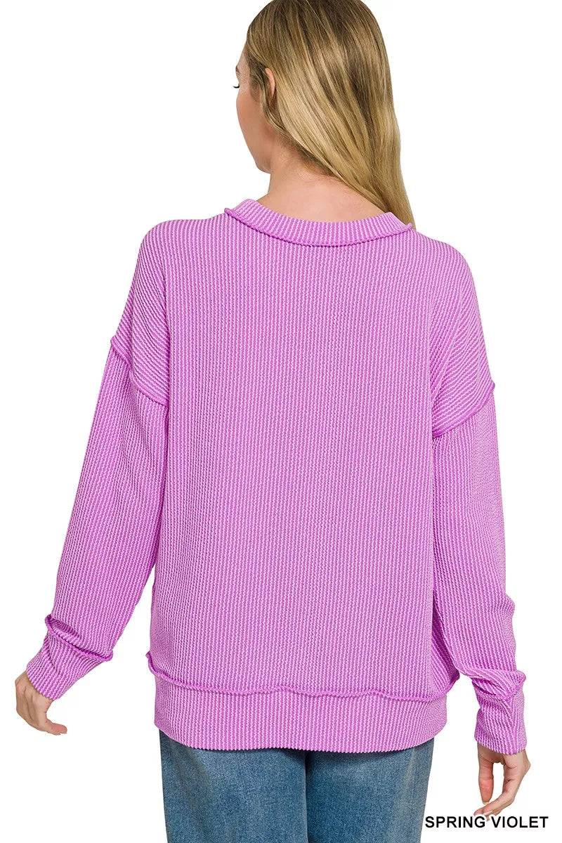 Close view of the corded rib knit texture in violet