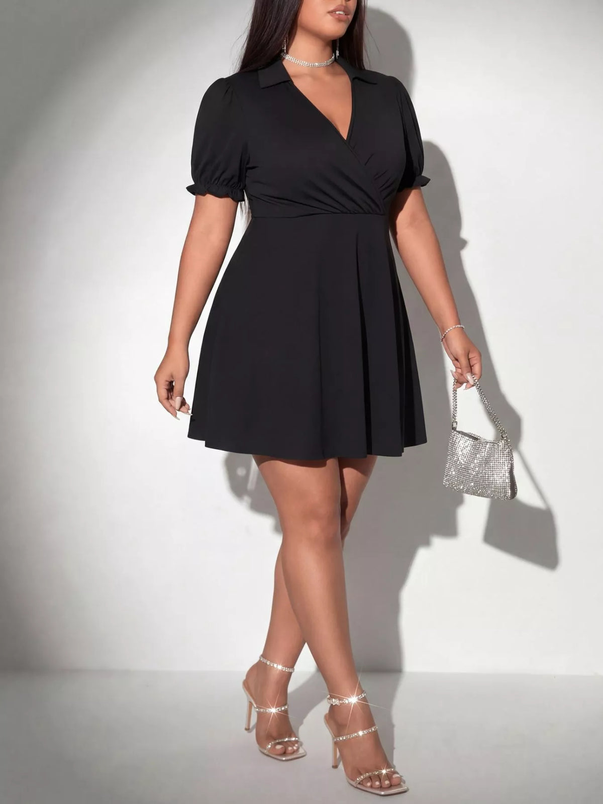 Plus size black short sleeve mini dress side view