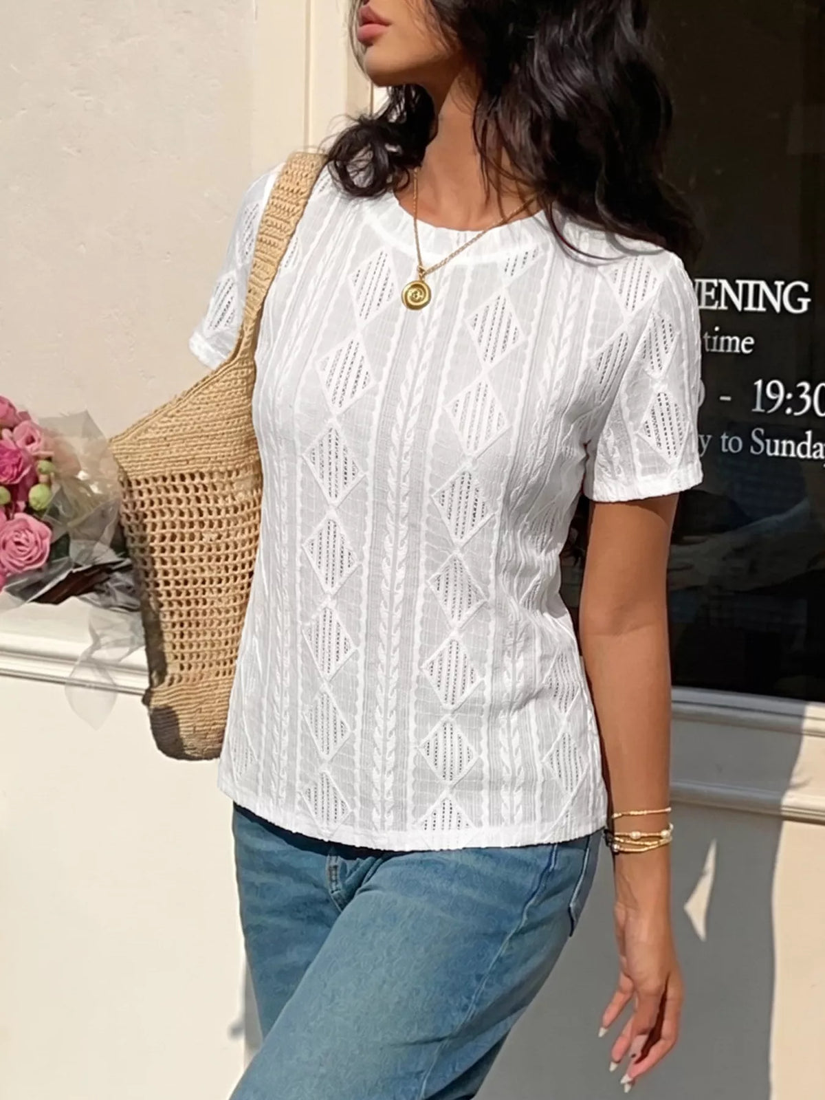 White textured knit tee side view