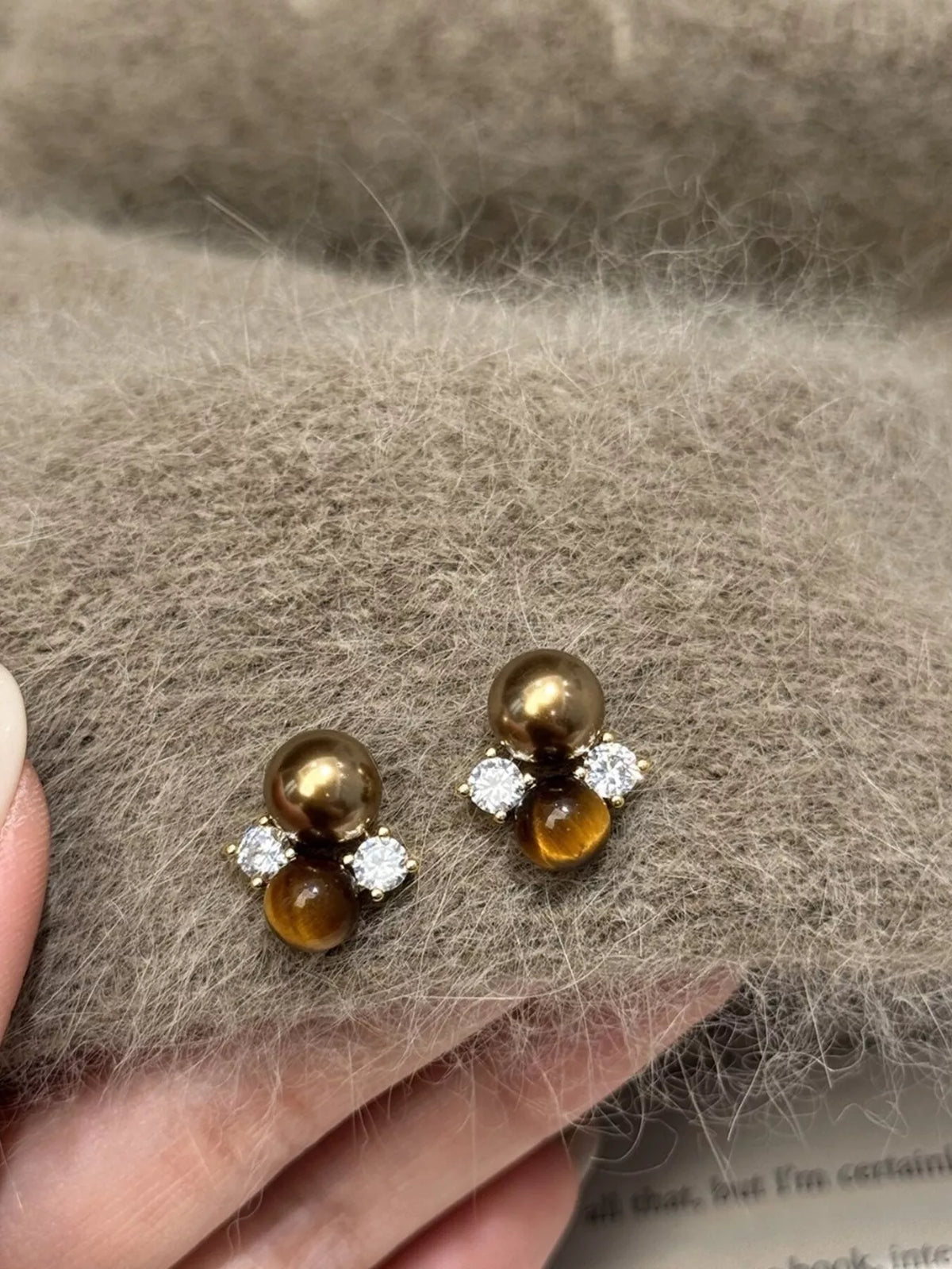 Tiger eye pearl stud earrings closeup detail