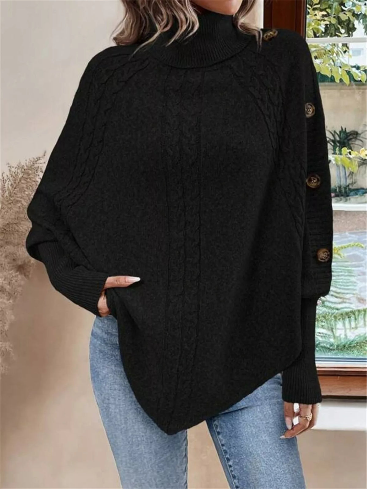 Cape sweater button detail