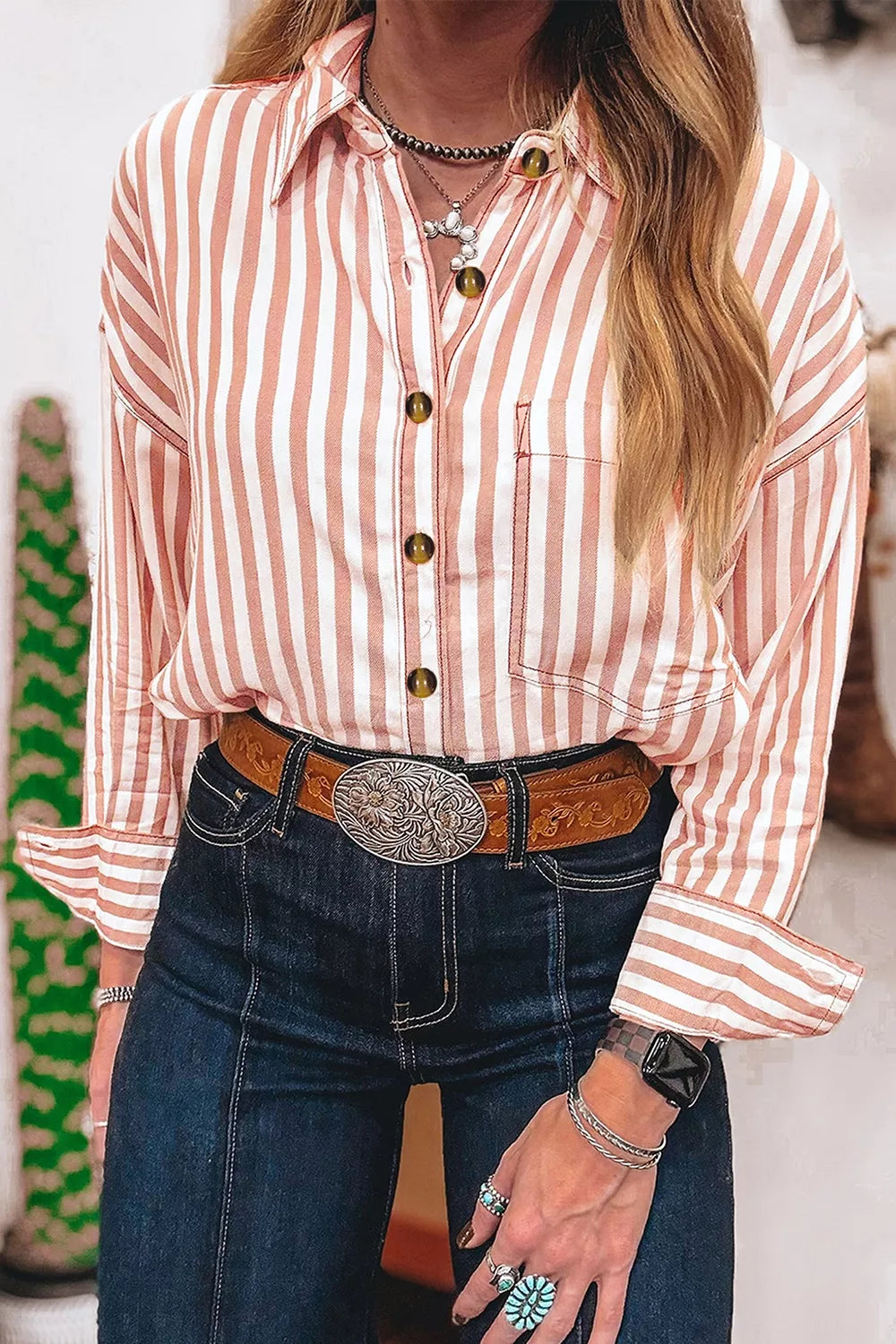 Close up of the button placket and stripe detail