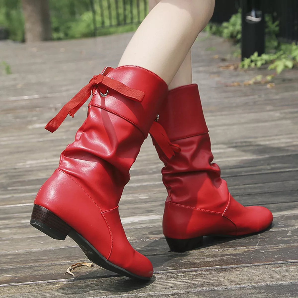 Round toe block heel boots paired with denim
