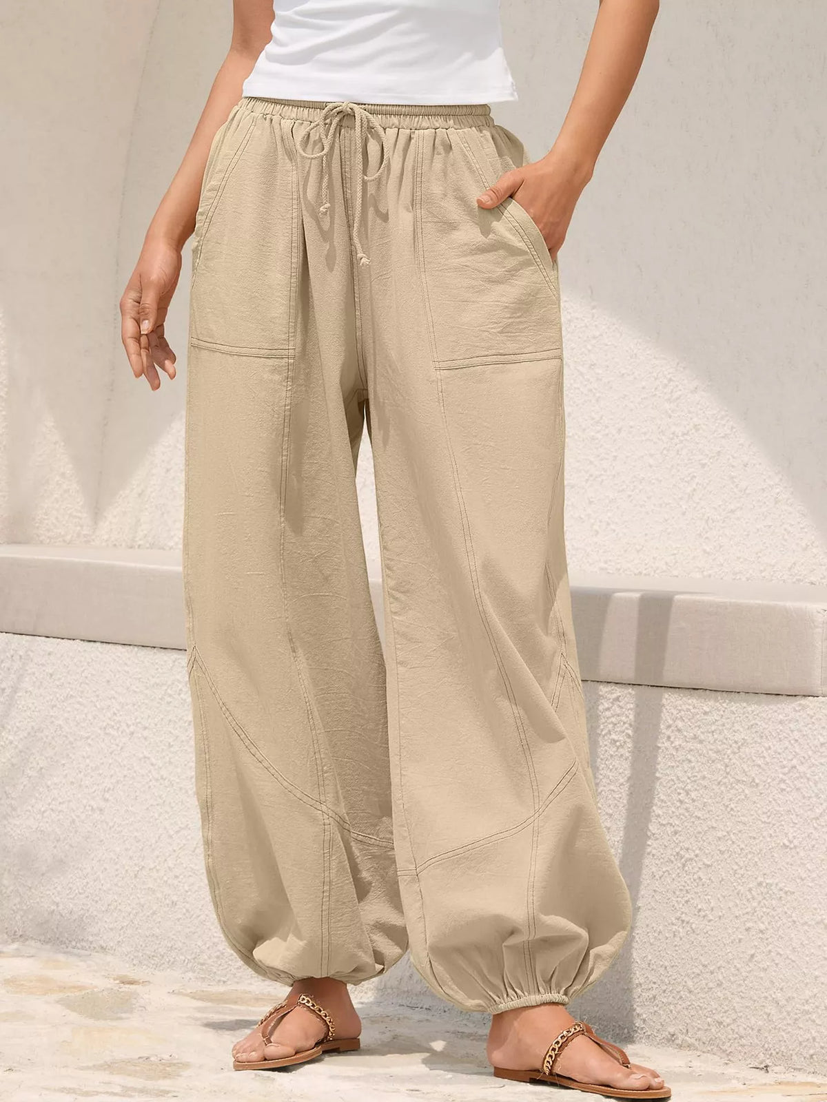 Loose fit drawstring waist harem joggers detail view