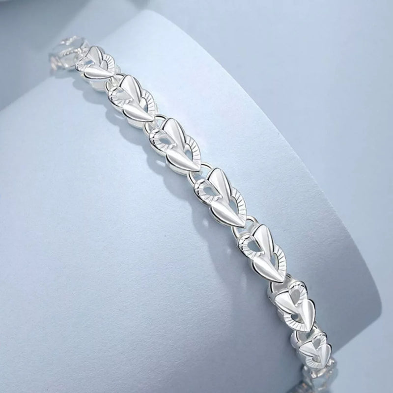 925 sterling silver heart link bracelet laid flat